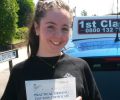 Caitlin with Driving test pass certificate